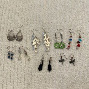 8 pairs of earrings.  Costume jewelry.